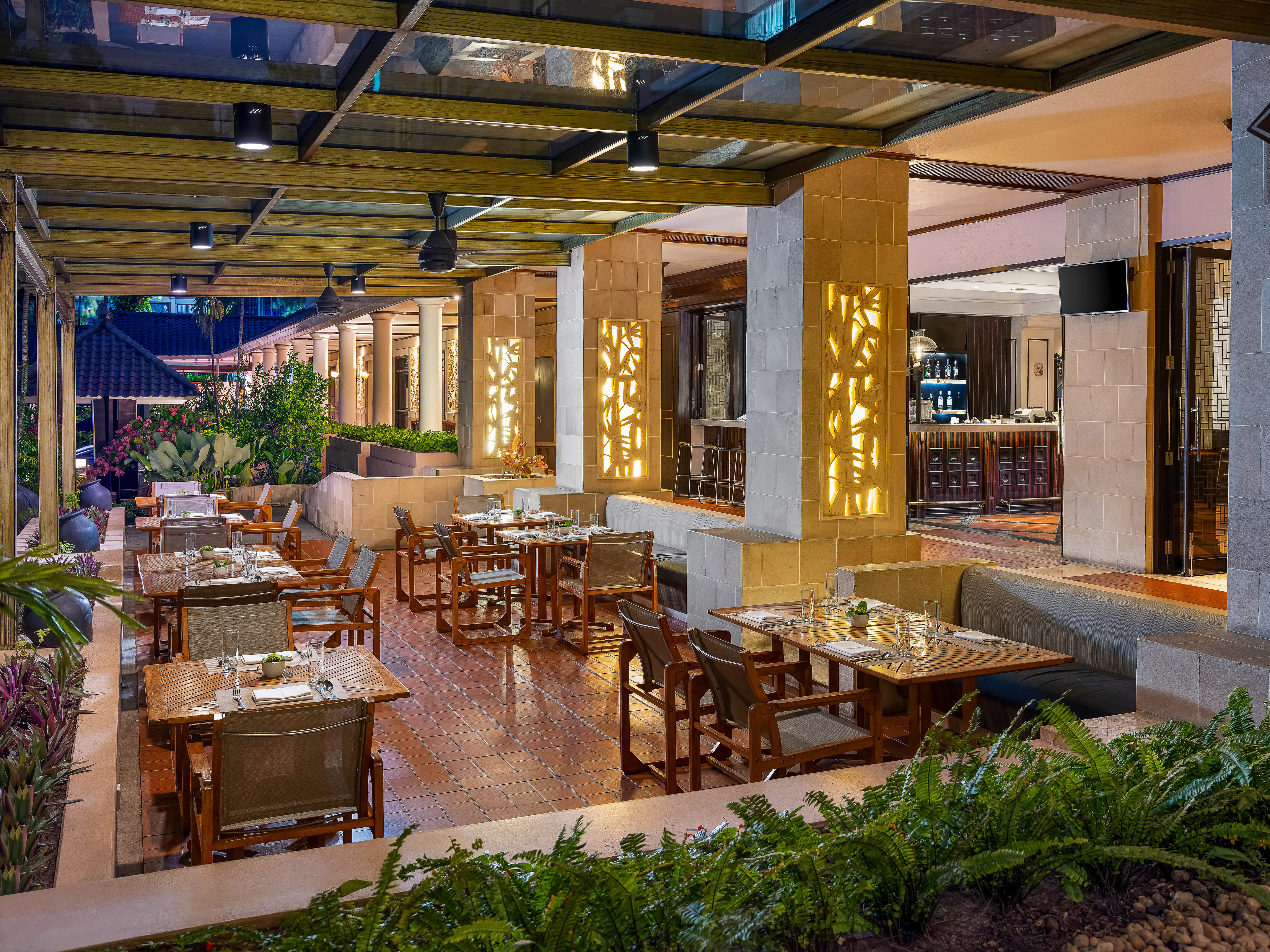 a restaurant with tables and chairs