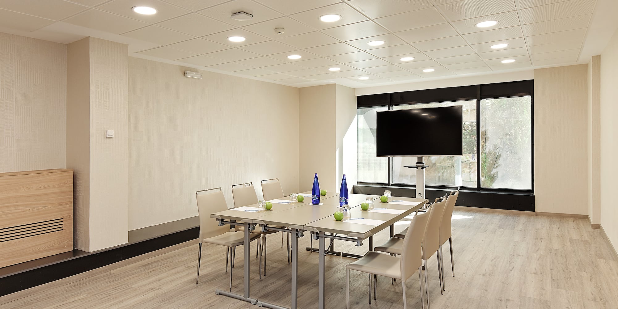 a room with a table and chairs