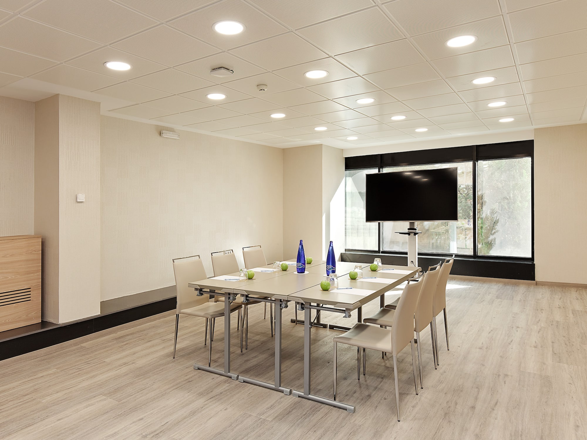 a room with a table and chairs