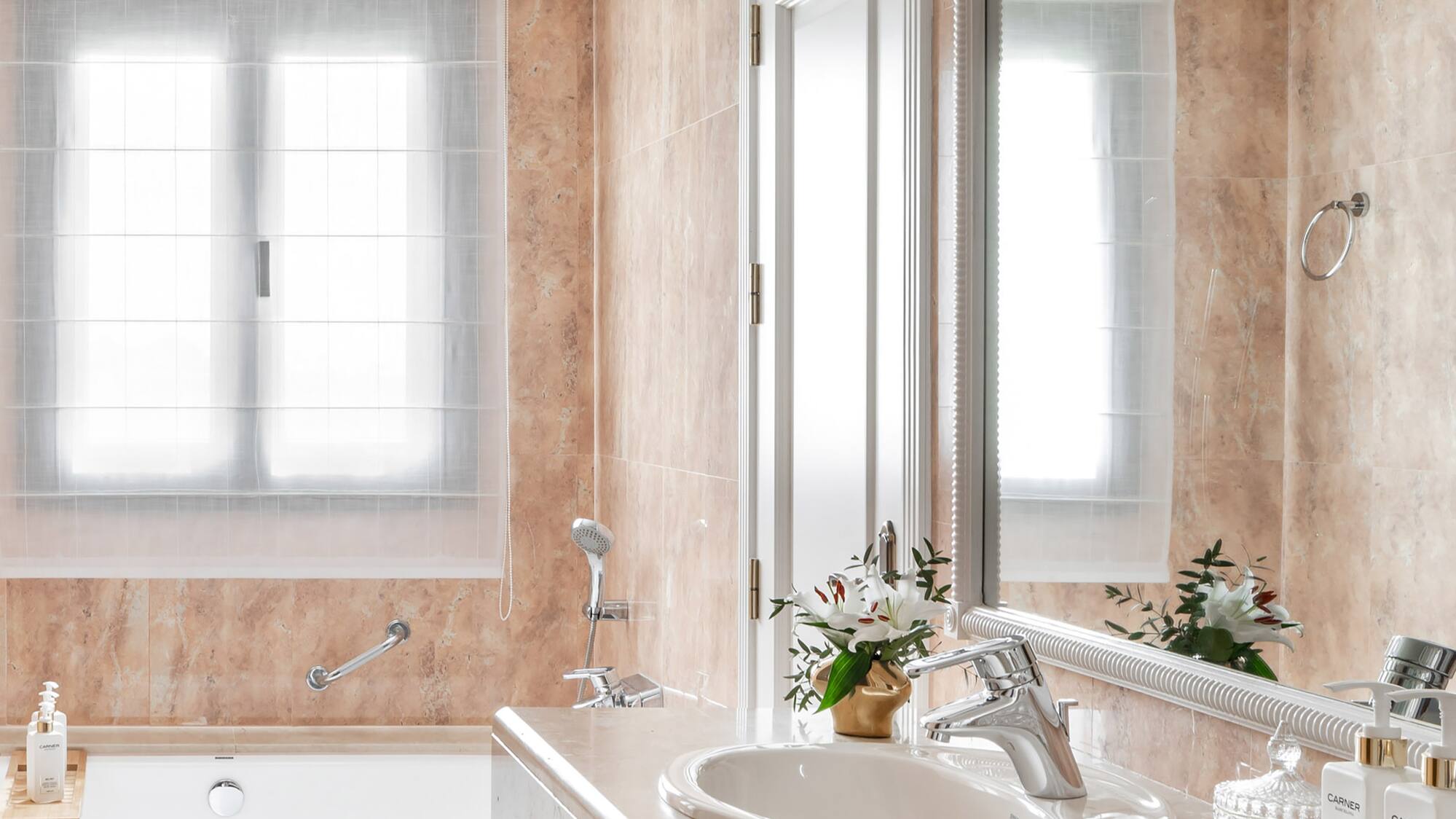 a bathroom with a sink and tub
