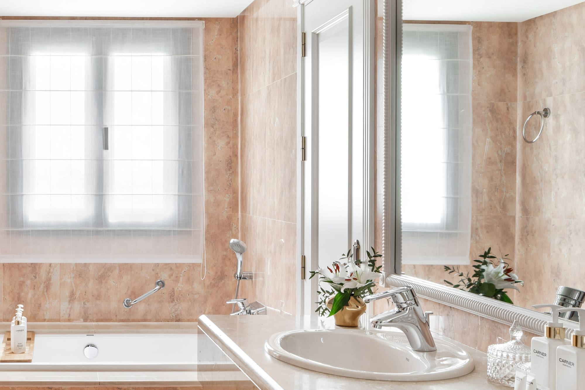 a bathroom with a sink and tub