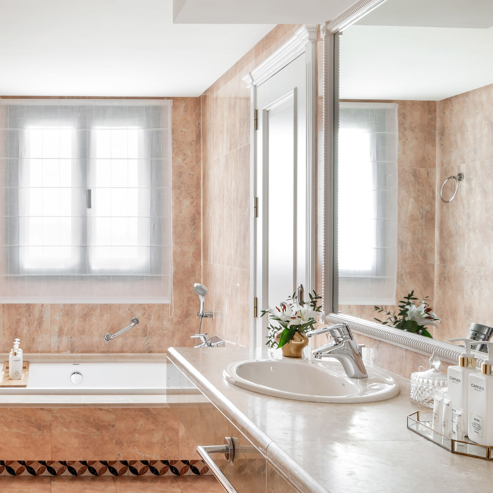 a bathroom with a sink and tub