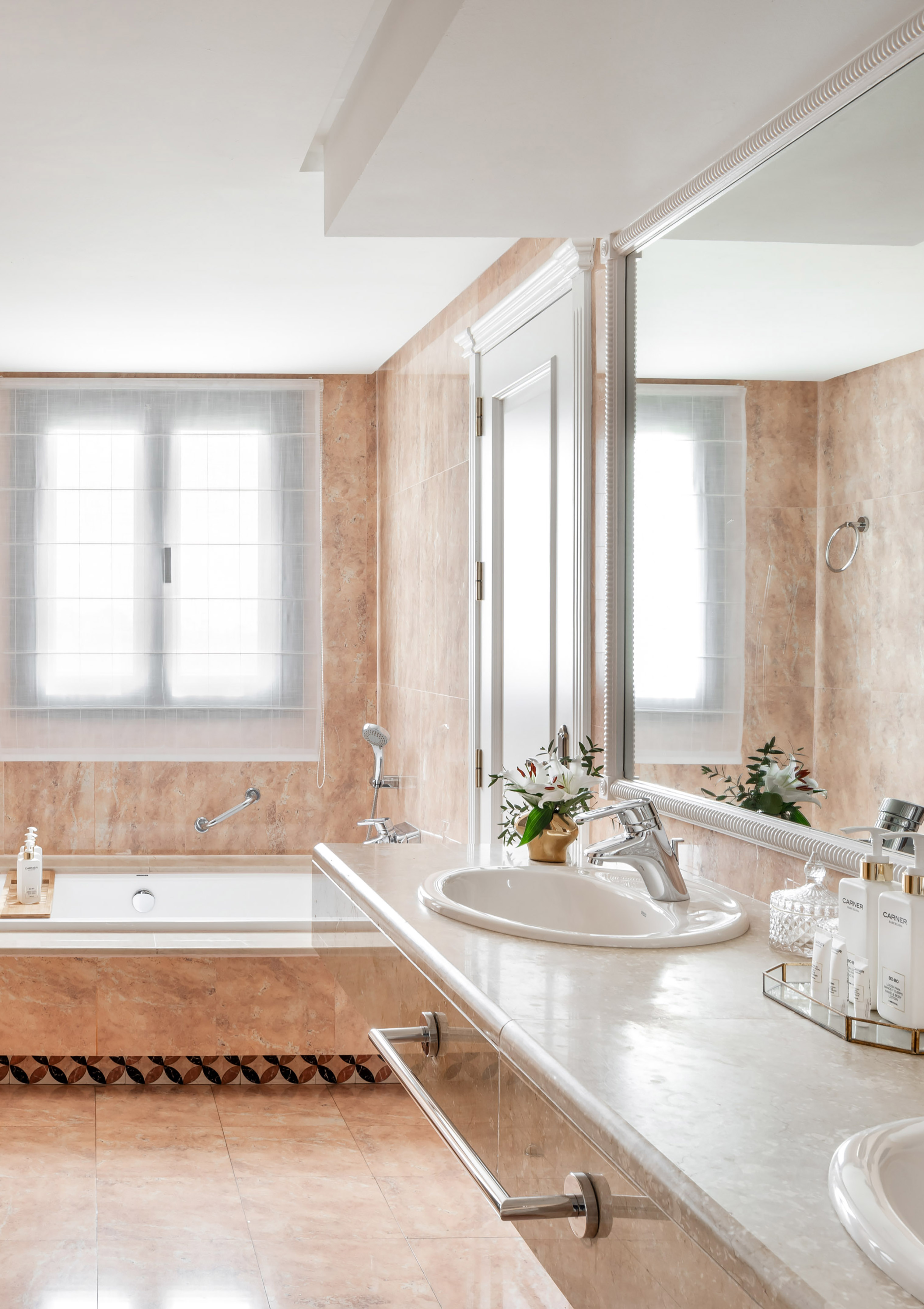 a bathroom with a sink and tub