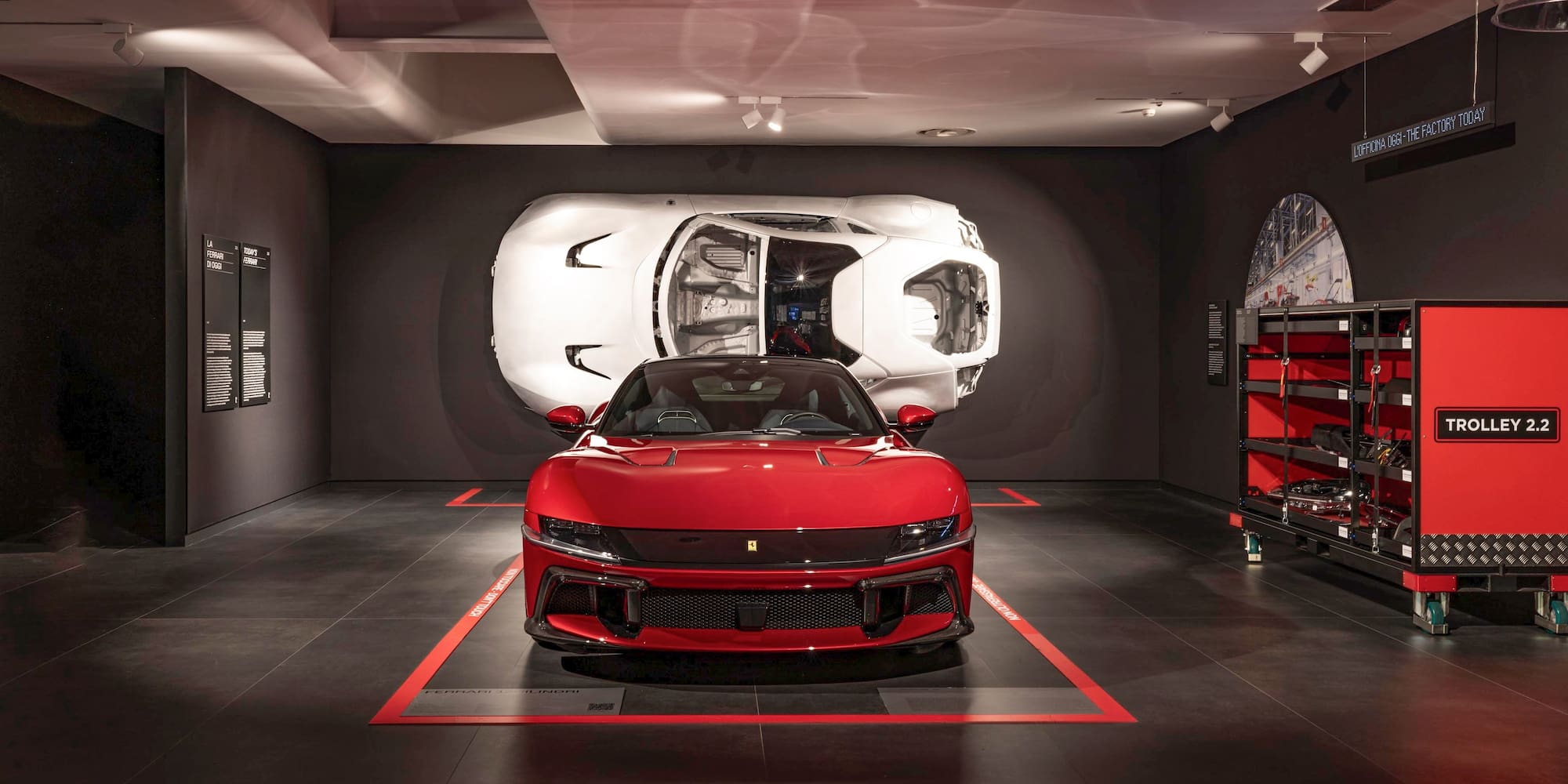 a red sports car in a garage