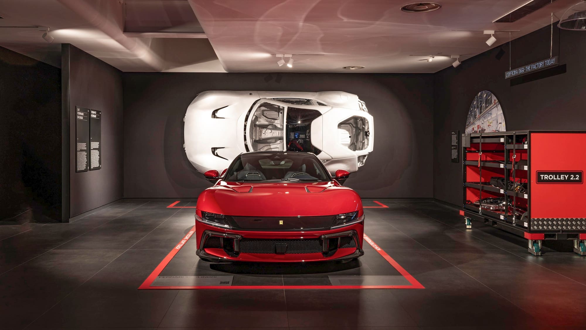 a red sports car in a garage