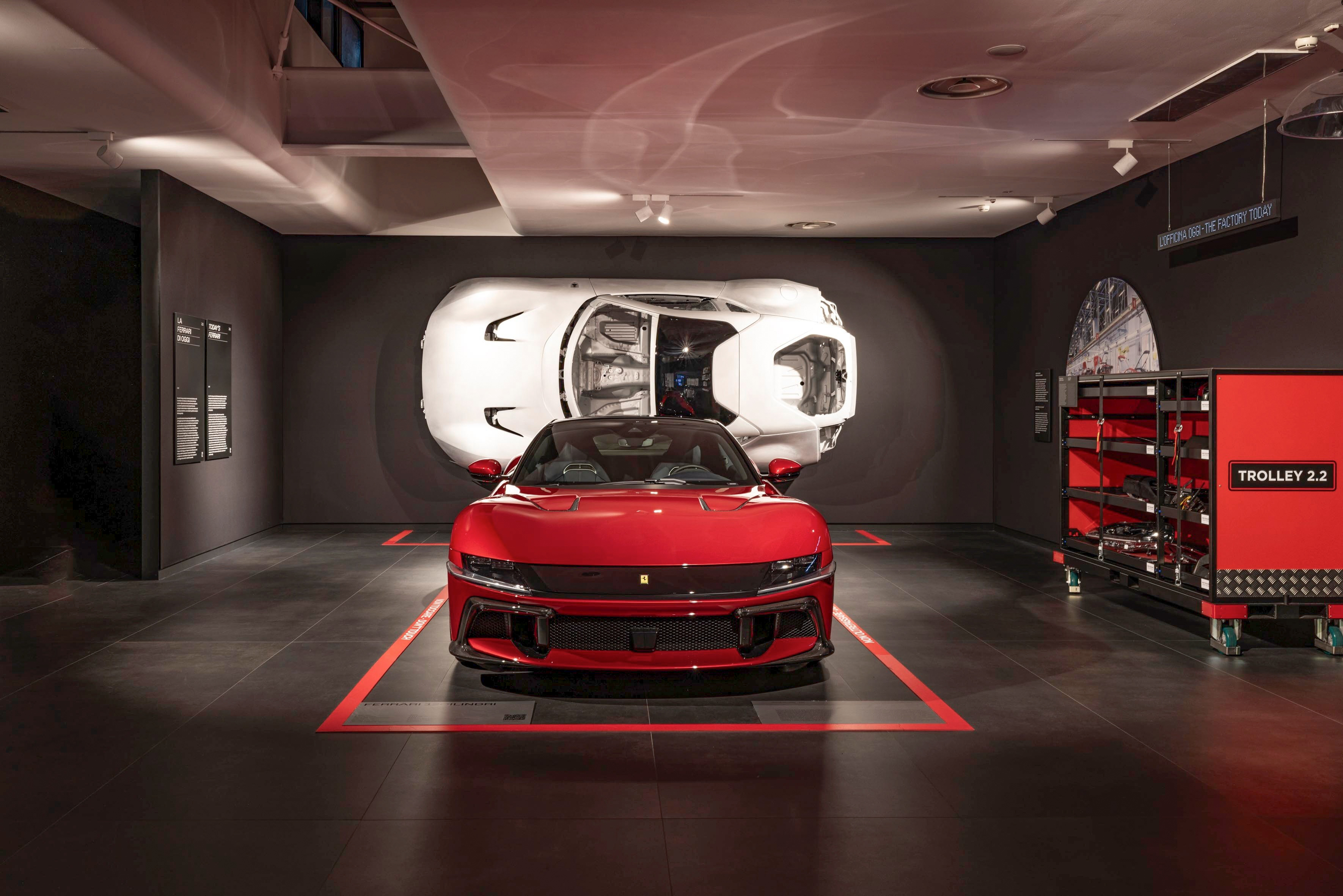 a red sports car in a garage