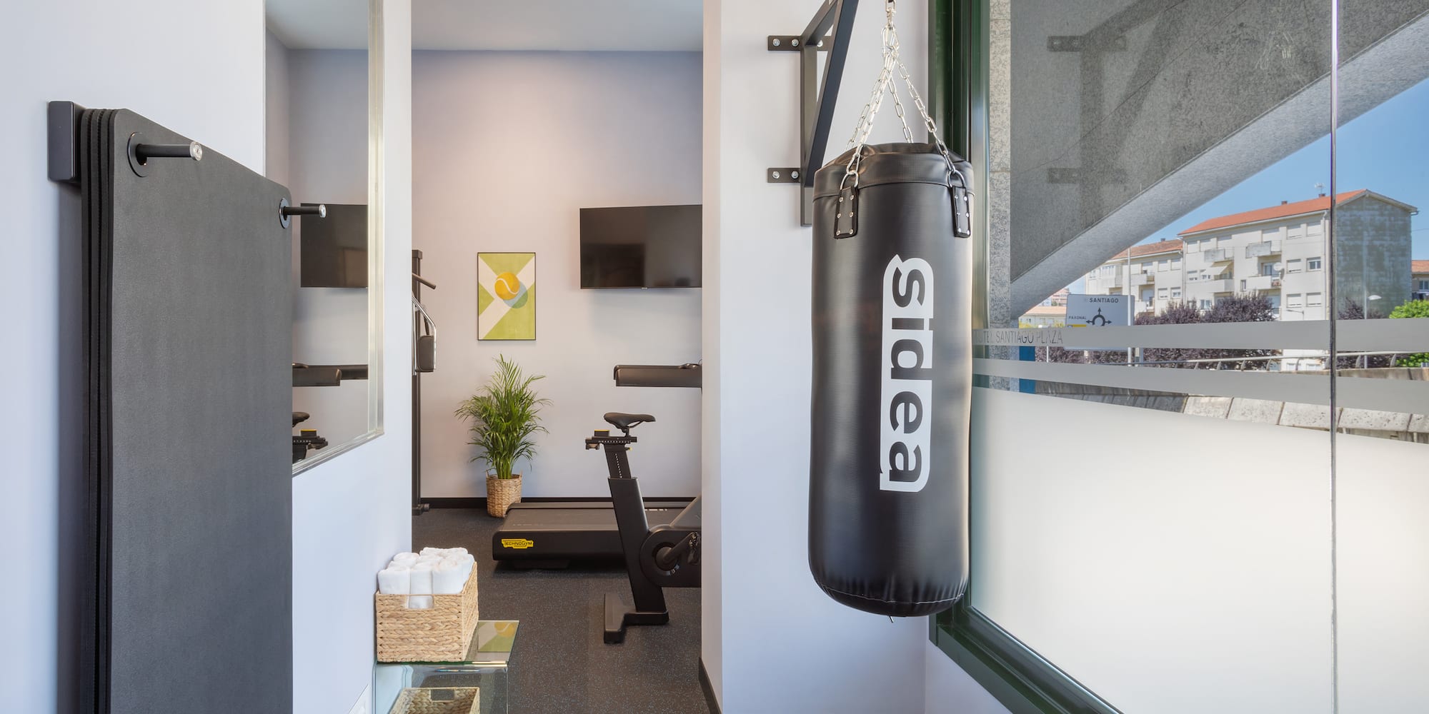 a punching bag from a wall in a gym