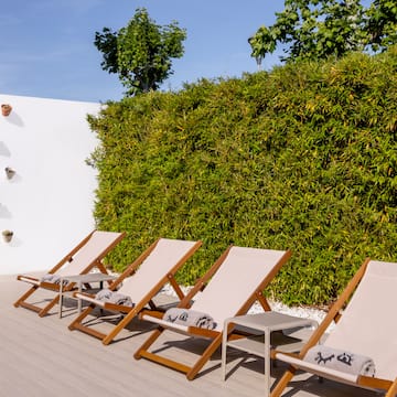 a group of chairs on a patio