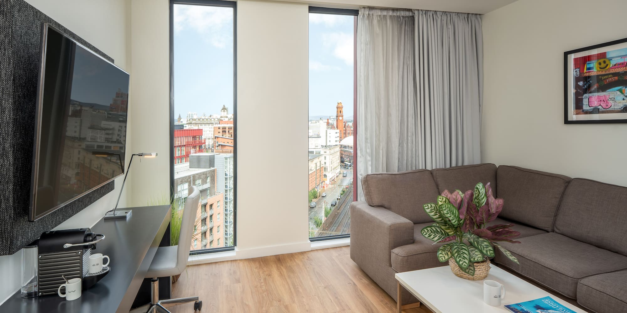 a living room with a couch and a tv