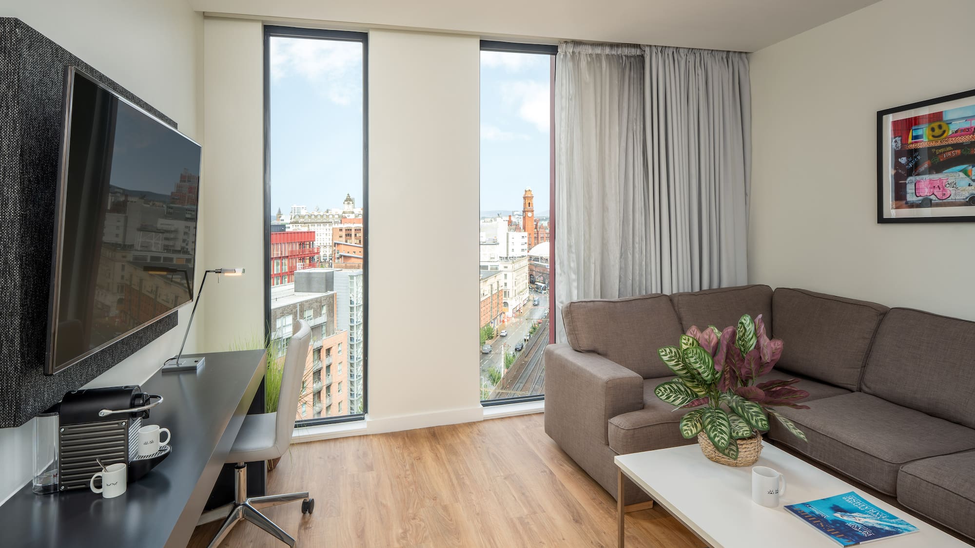 a living room with a couch and a tv