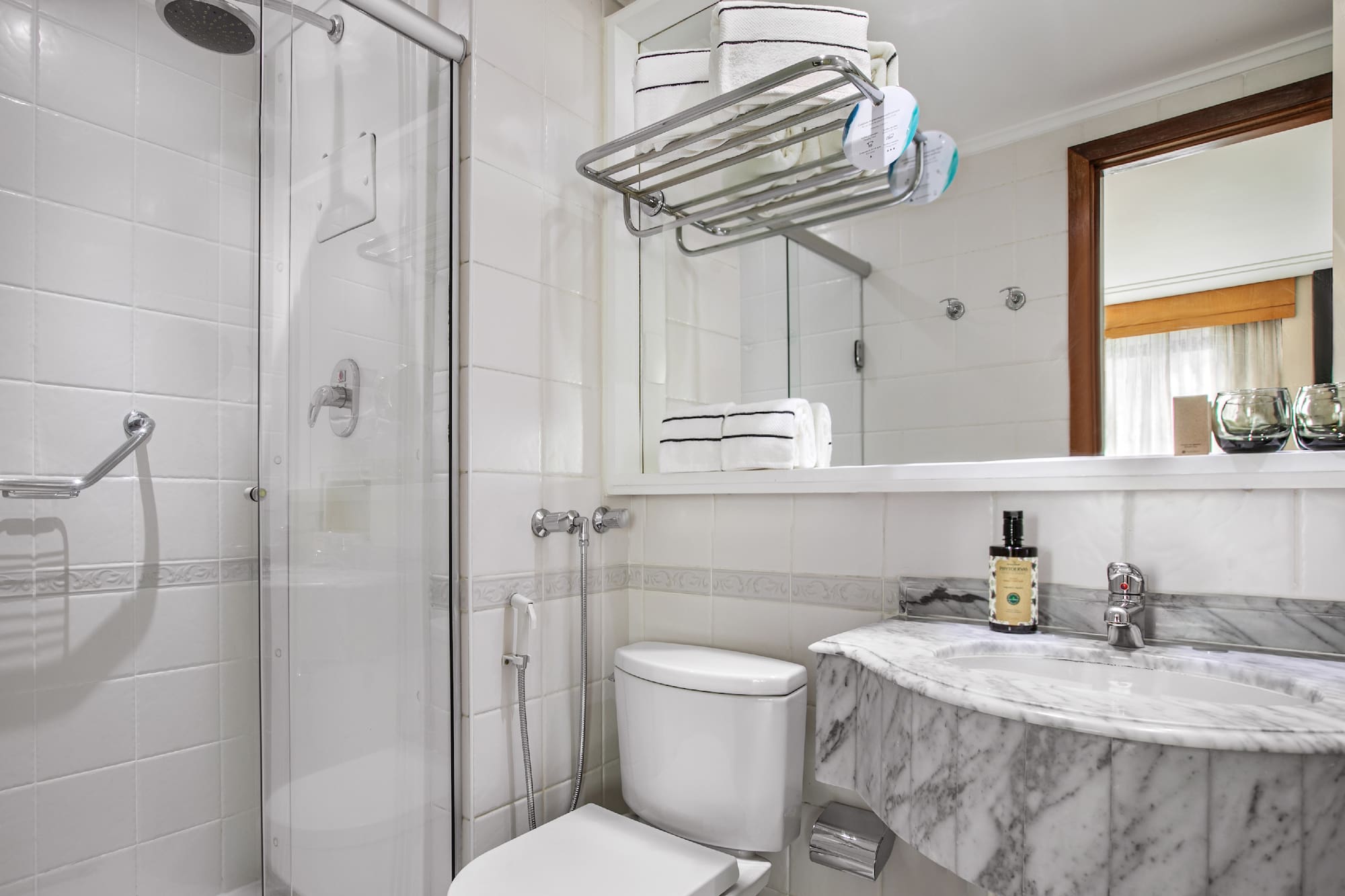 a bathroom with a shower and toilet