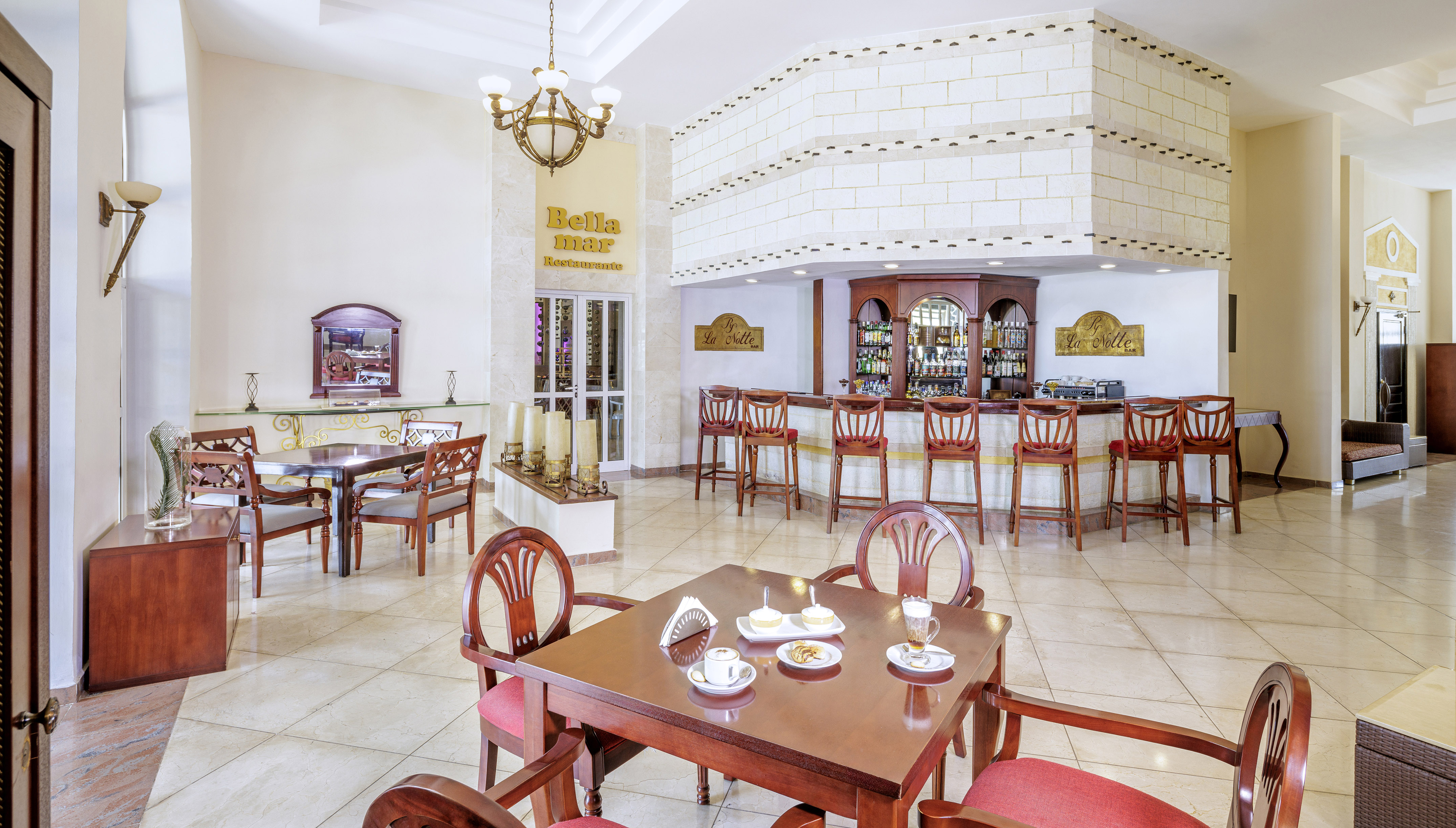 a room with a table and chairs