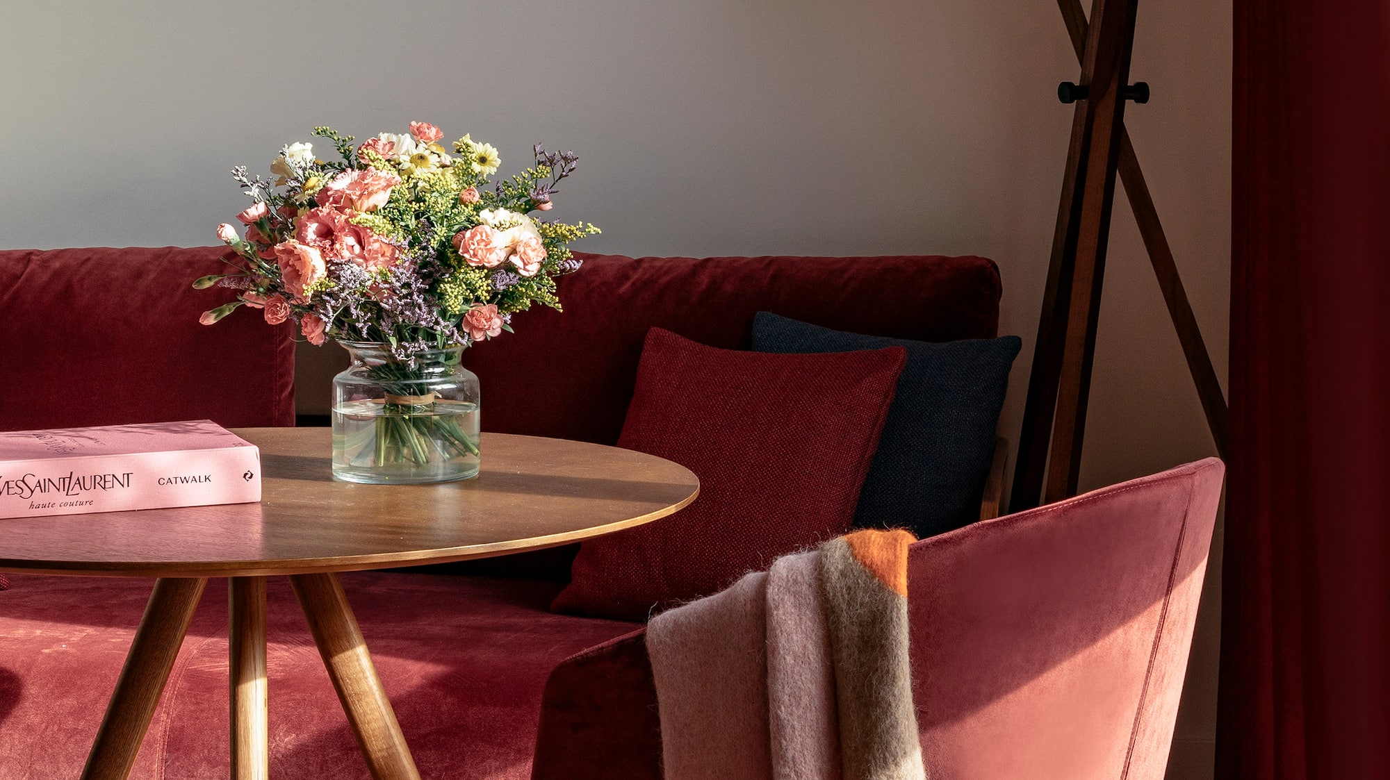 a table with a vase of flowers on it