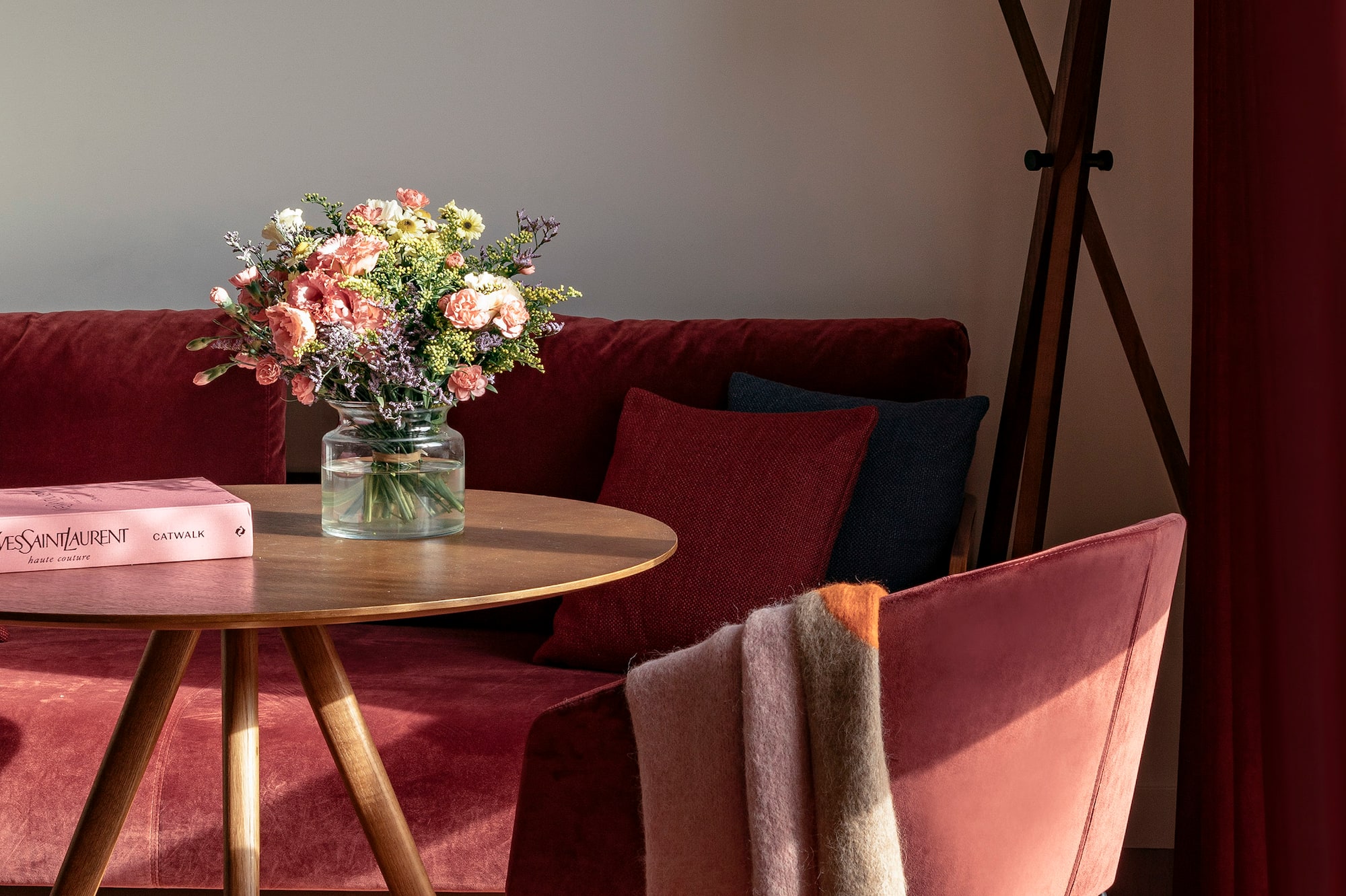 a table with a vase of flowers on it