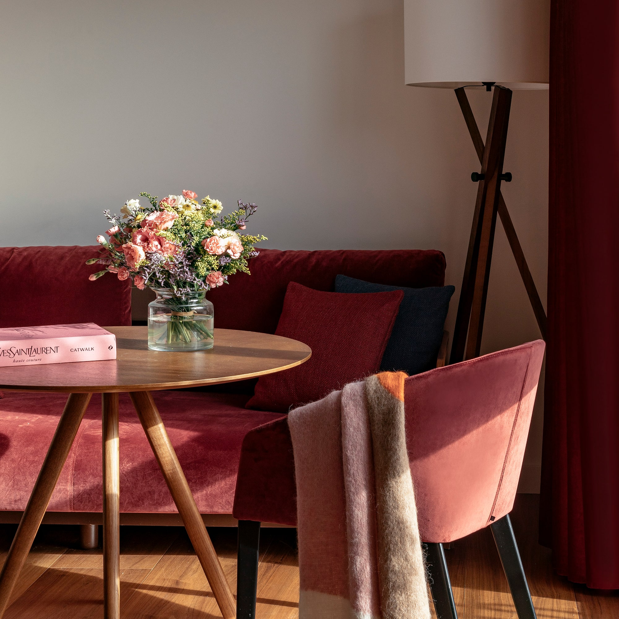 a table with a vase of flowers on it