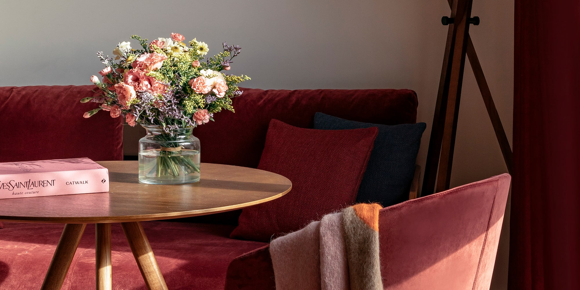 a table with a vase of flowers on it