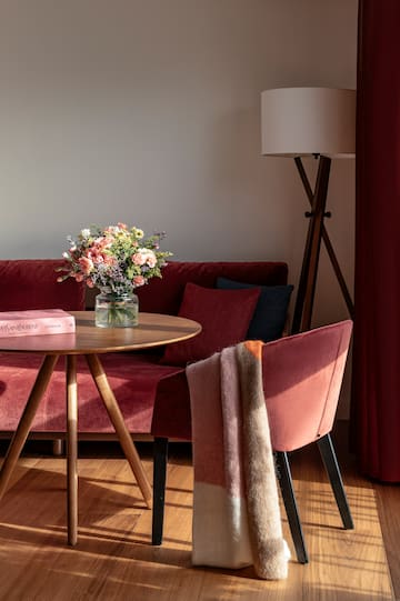 a table with a vase of flowers on it