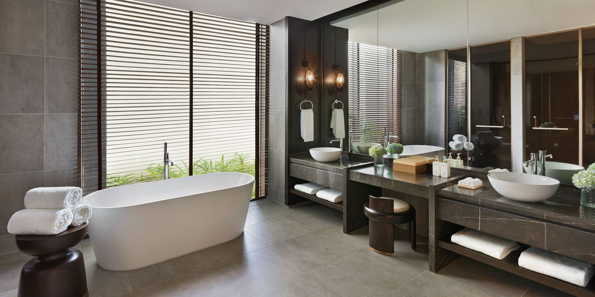 a bathroom with a tub and sink