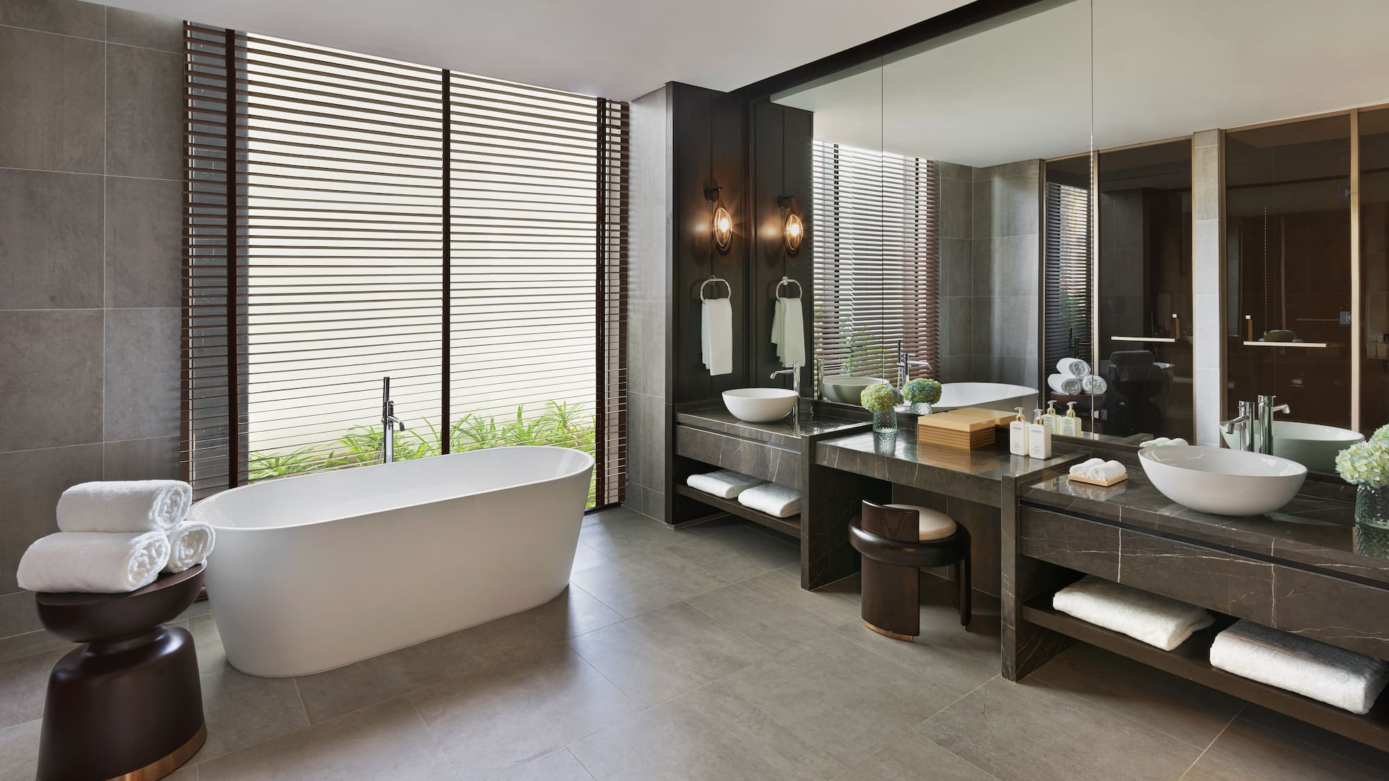 a bathroom with a tub and sink