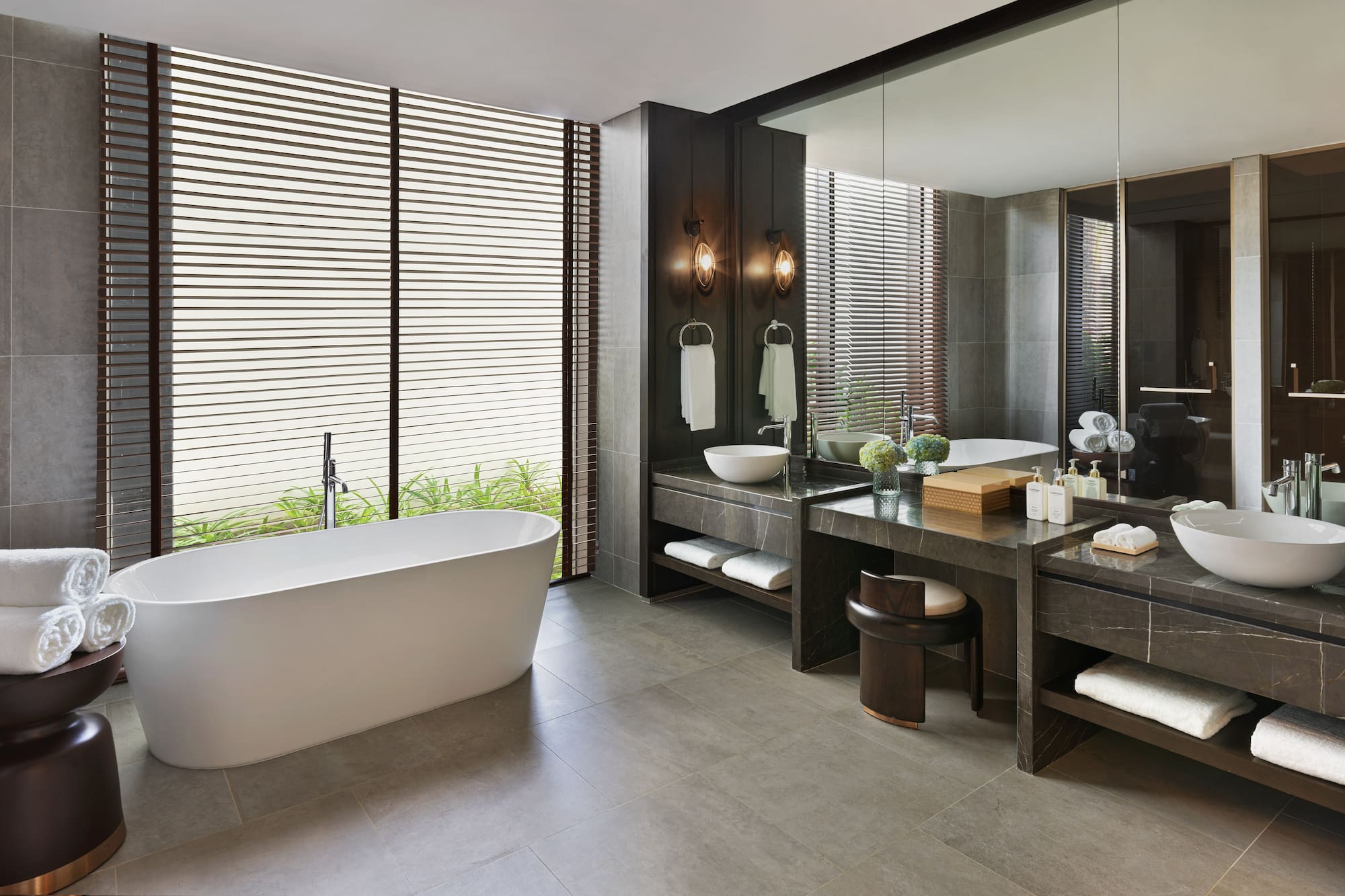 a bathroom with a tub and sink