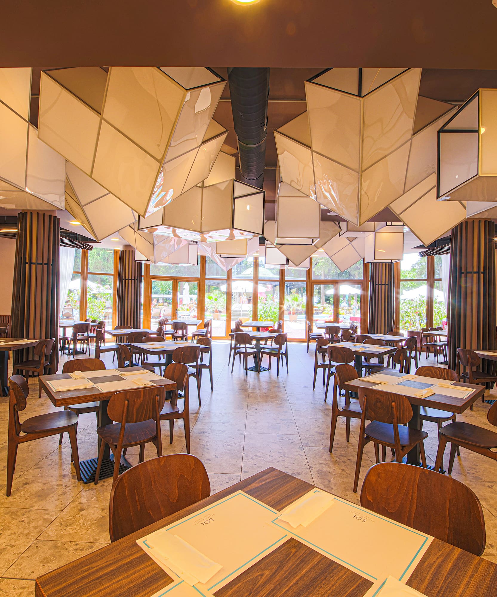 a room with tables and chairs