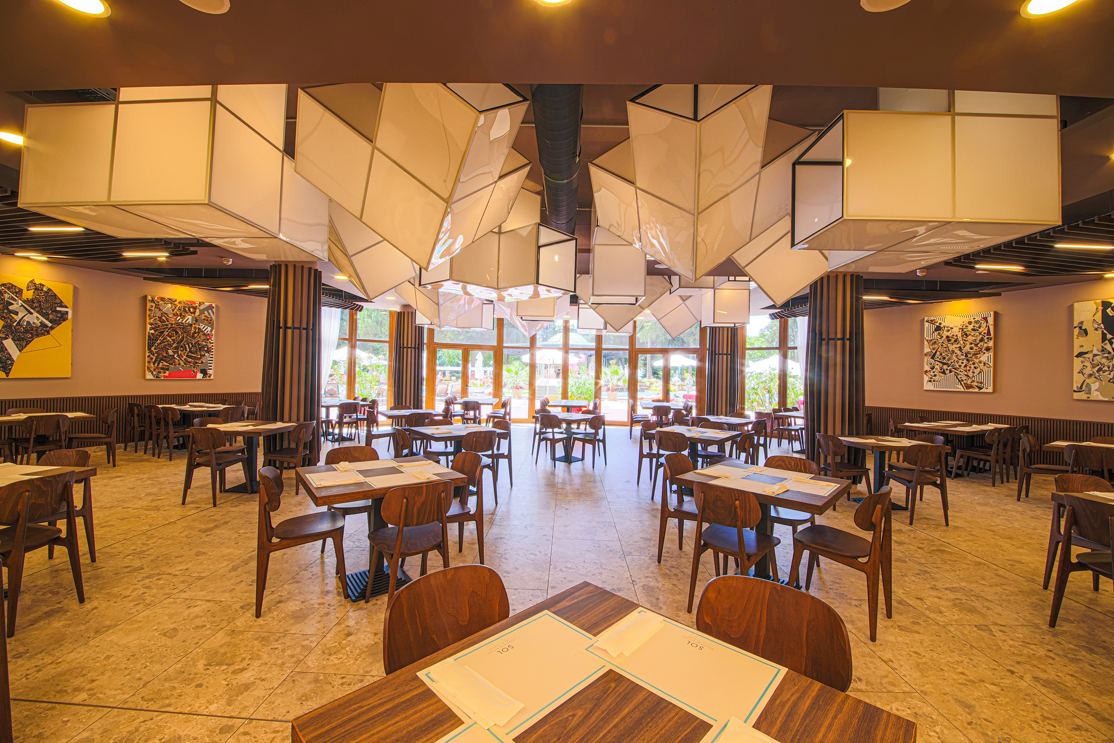 a room with tables and chairs