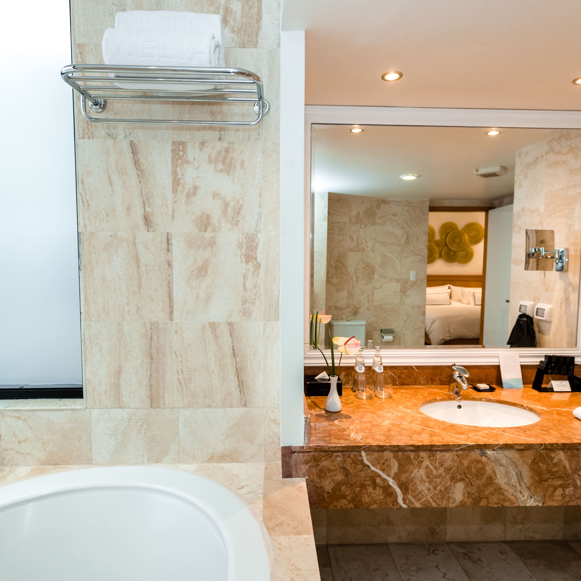 a bathroom with a sink and mirror