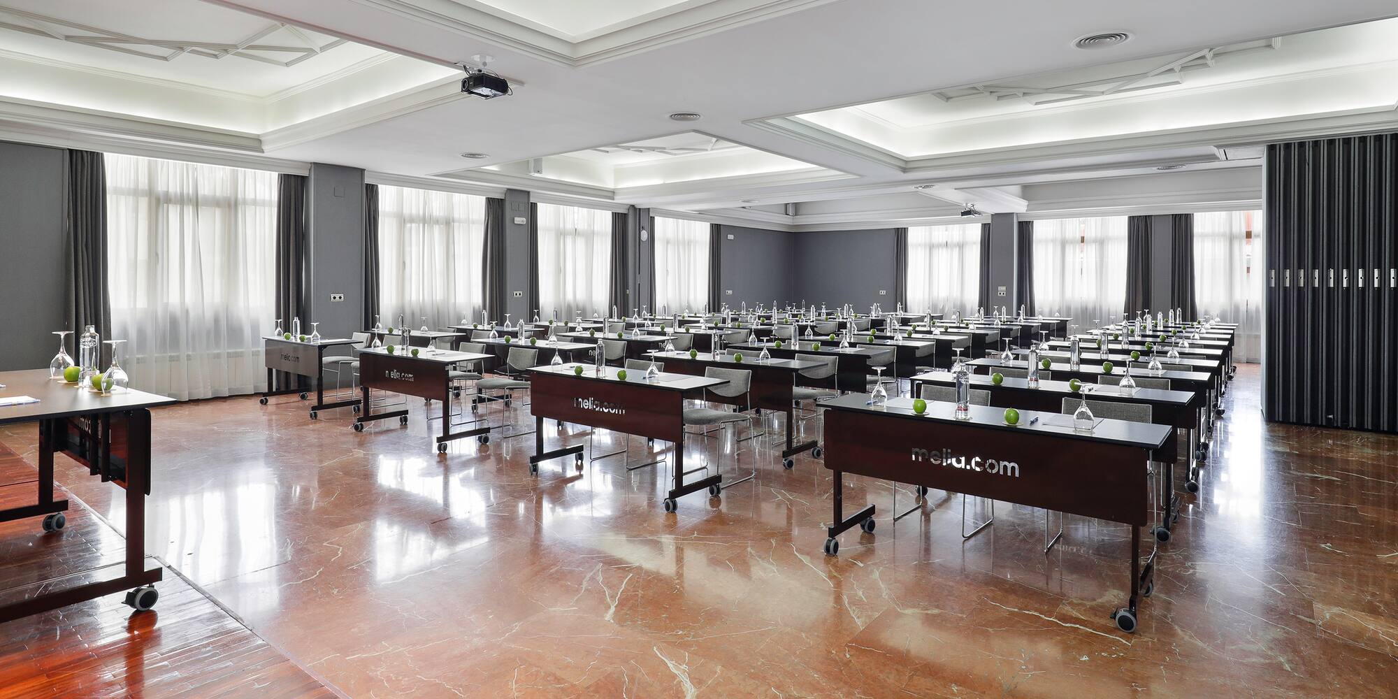 a room with tables and chairs