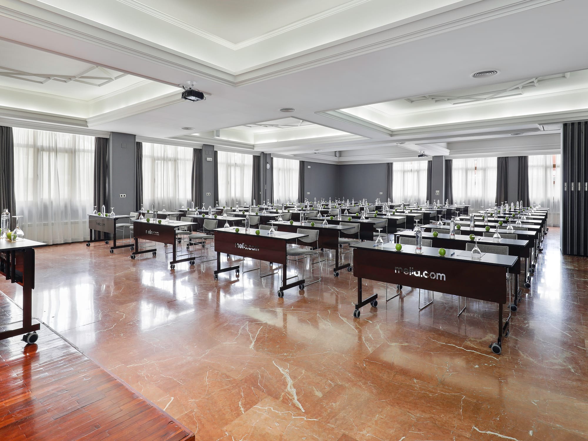 a room with tables and chairs