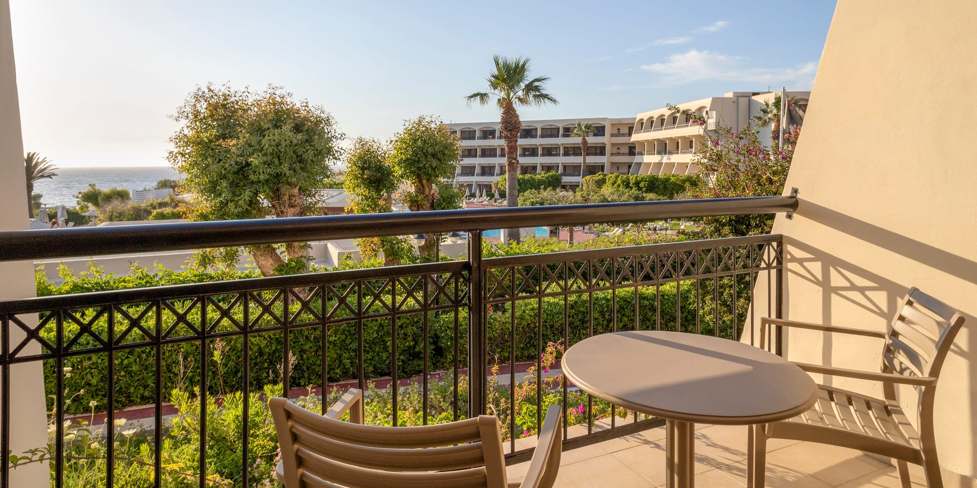 a table and chair on a balcony