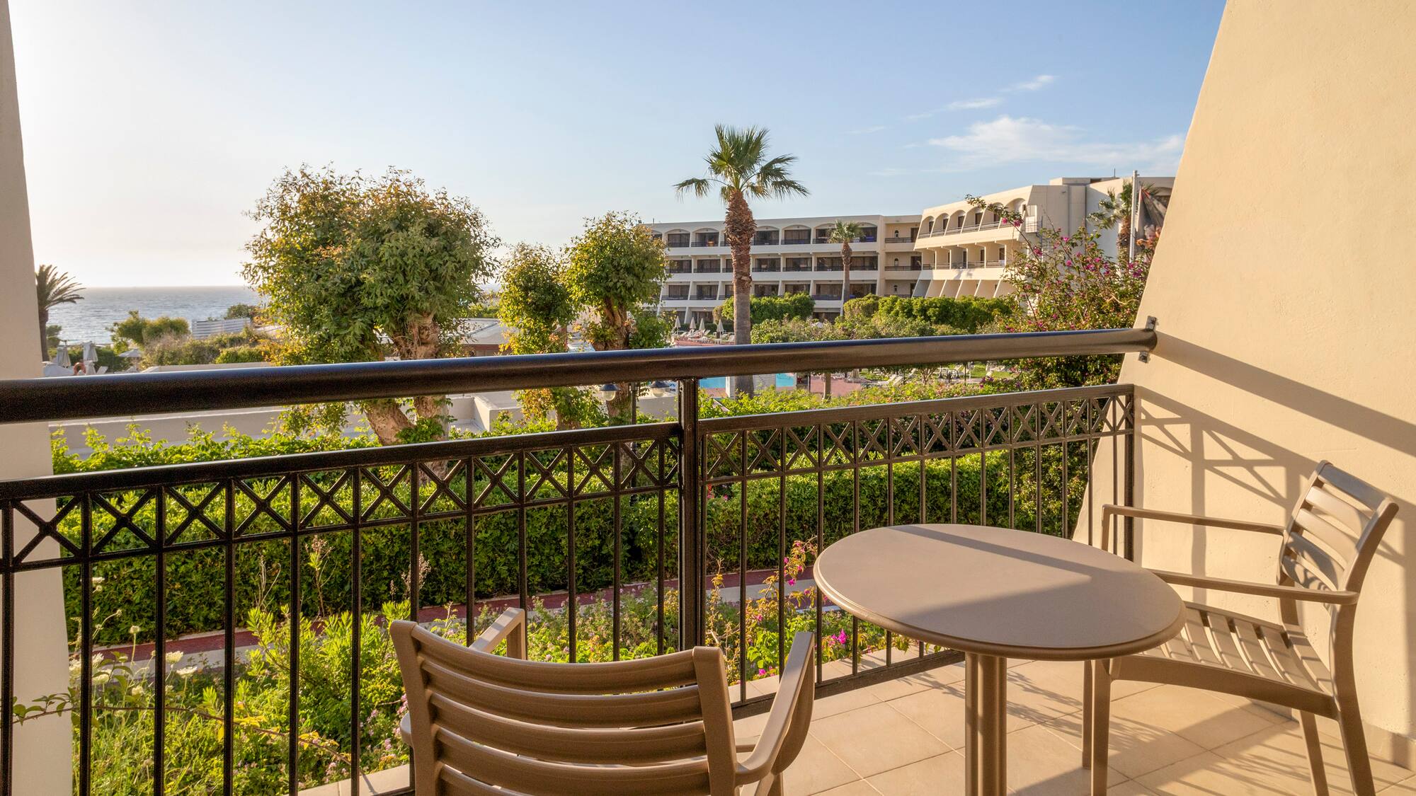 a table and chair on a balcony
