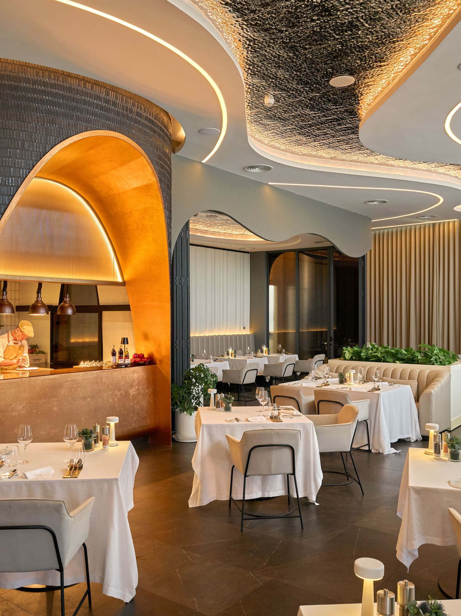 a restaurant with tables and chairs