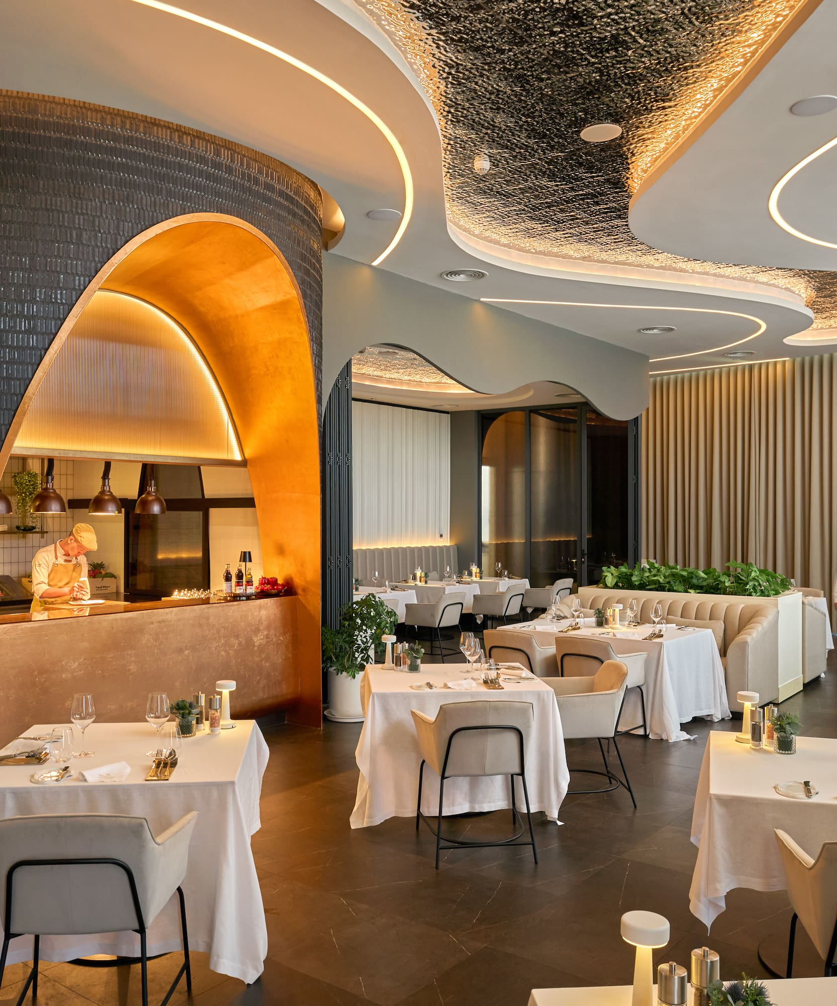 a restaurant with tables and chairs