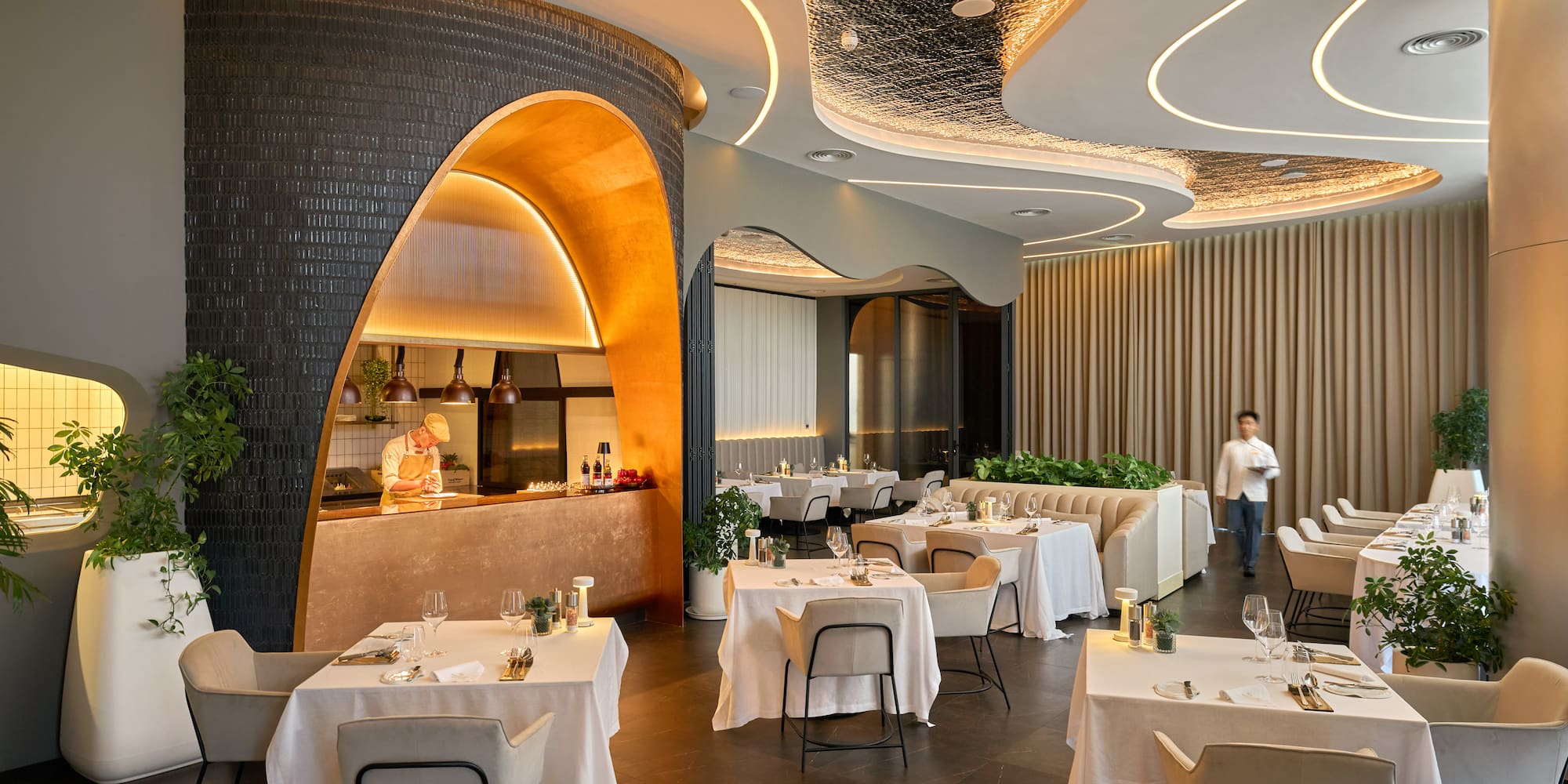 a restaurant with tables and chairs