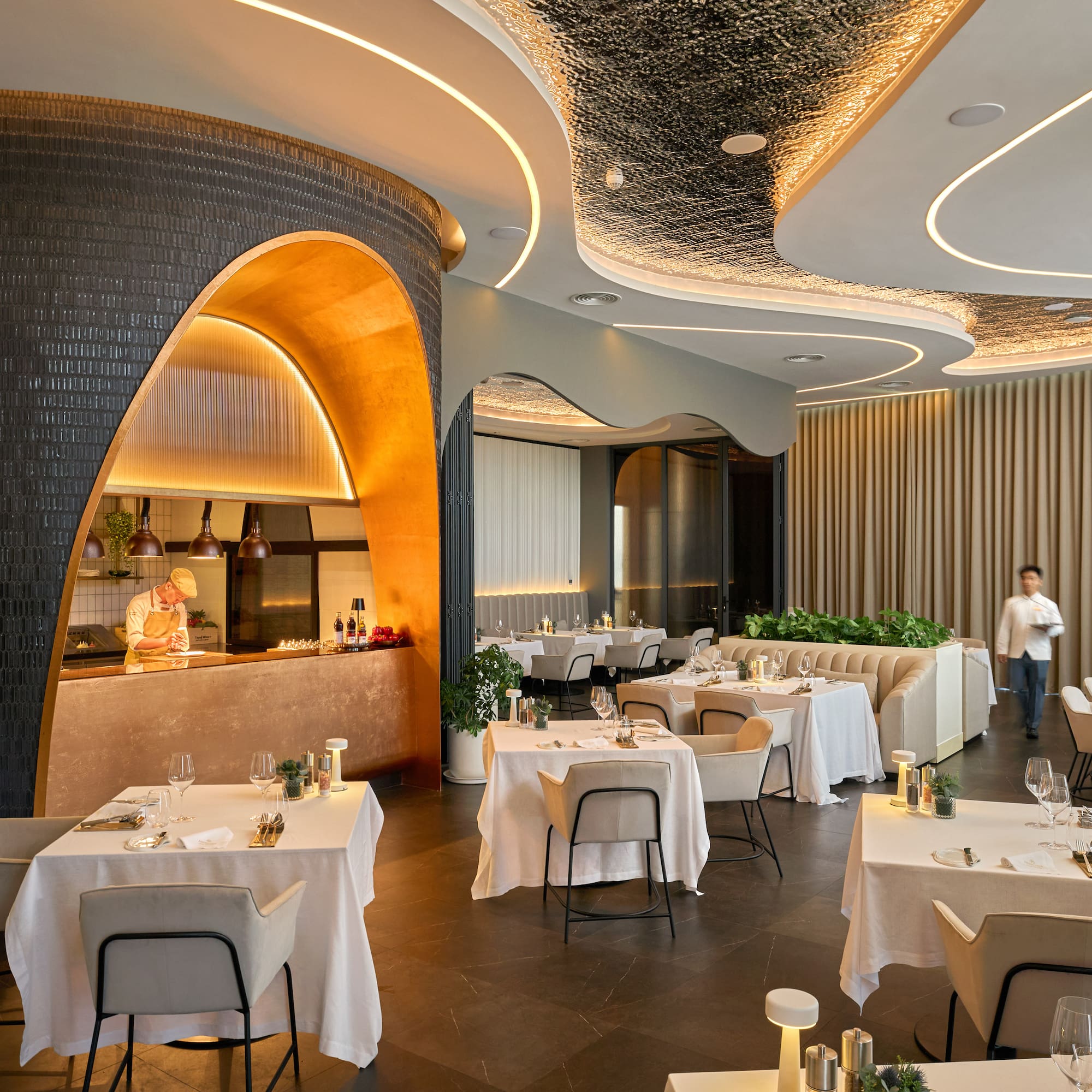 a restaurant with tables and chairs