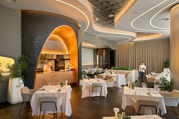 a restaurant with tables and chairs