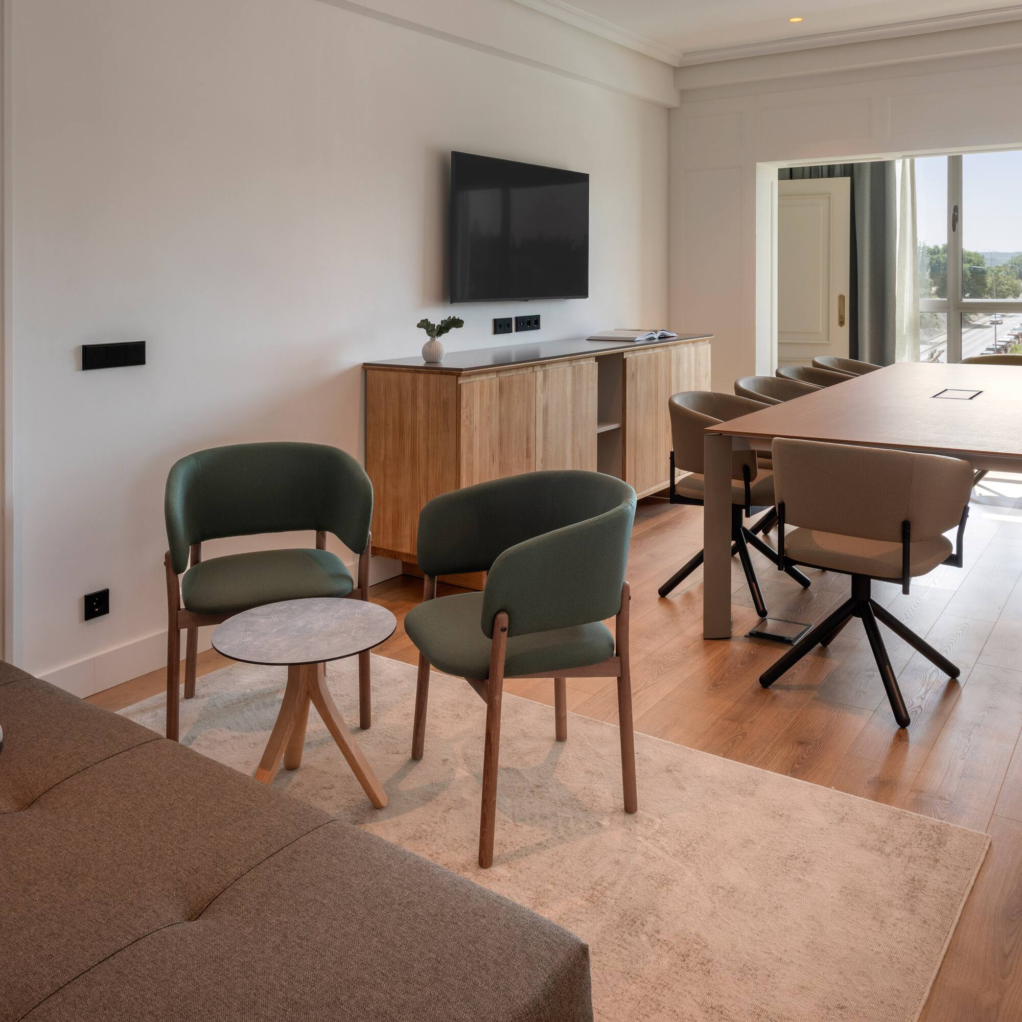 a room with a table and chairs