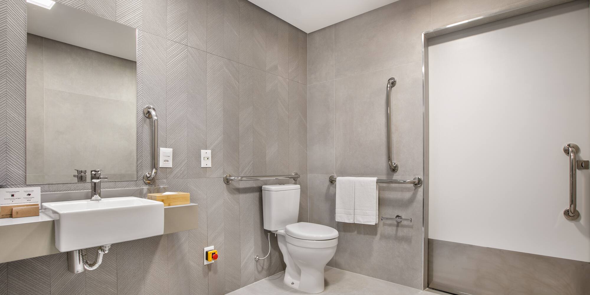 a bathroom with a toilet and sink