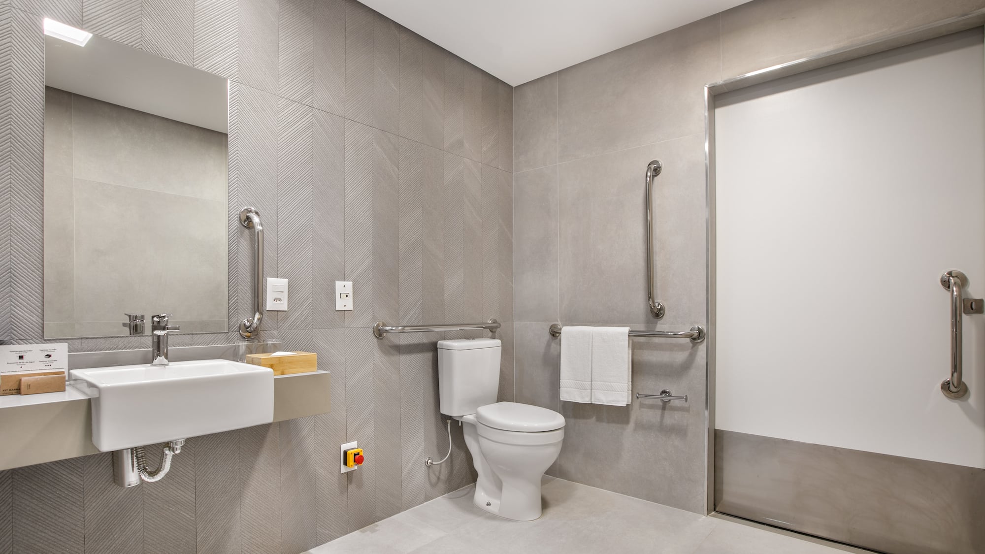 a bathroom with a toilet and sink