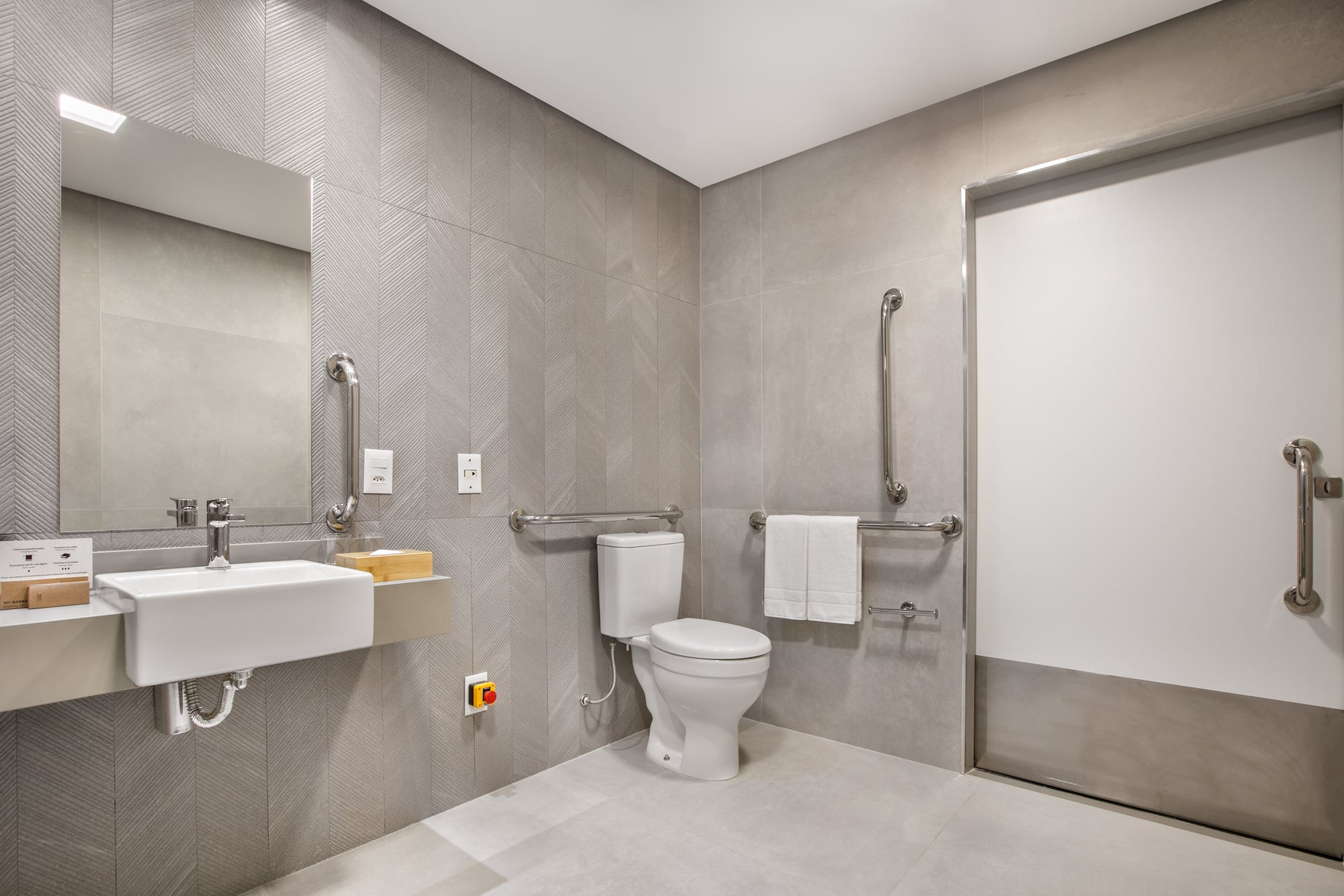 a bathroom with a toilet and sink