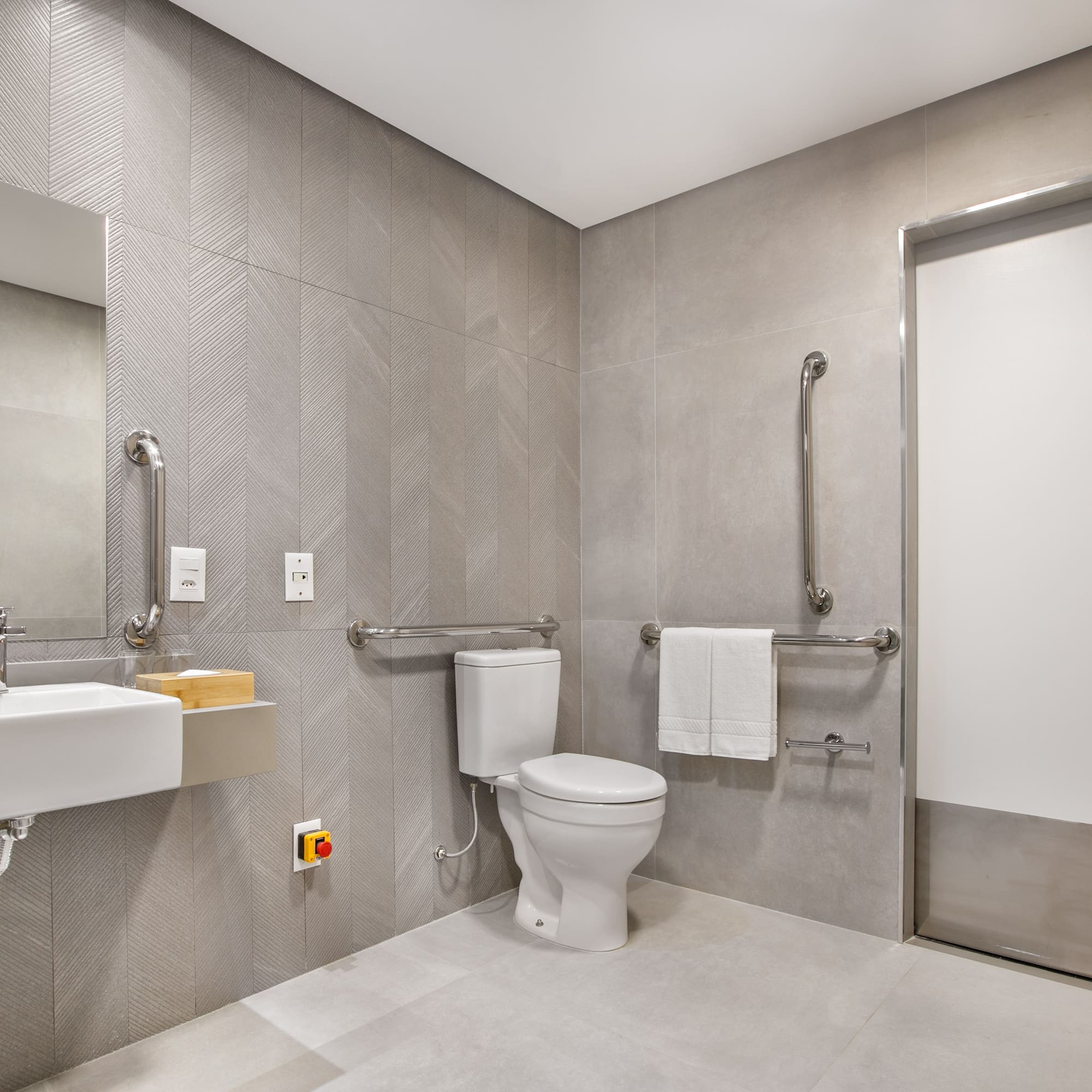 a bathroom with a toilet and sink