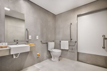 a bathroom with a toilet and sink