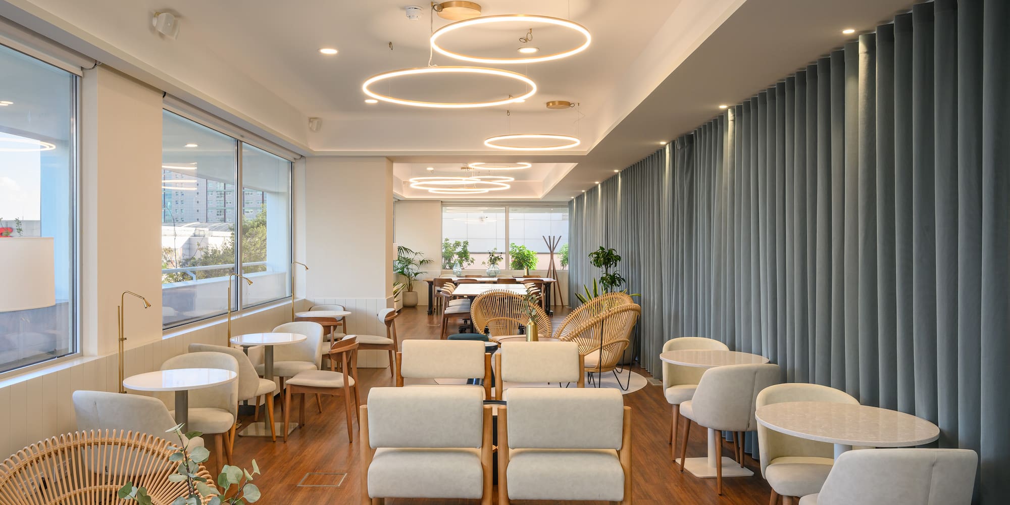 a room with tables and chairs