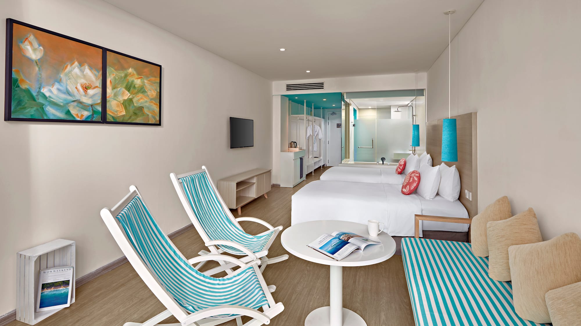 a room with a bed and chairs