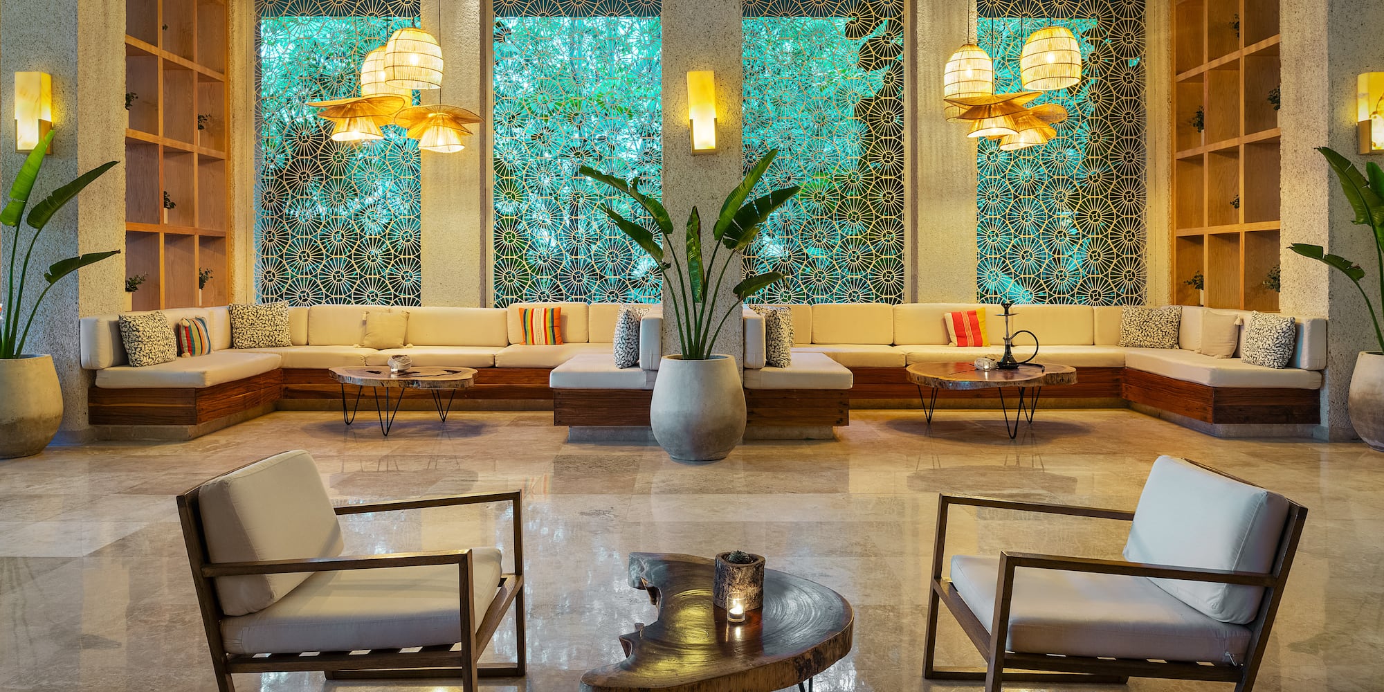 a room with a large window and chairs