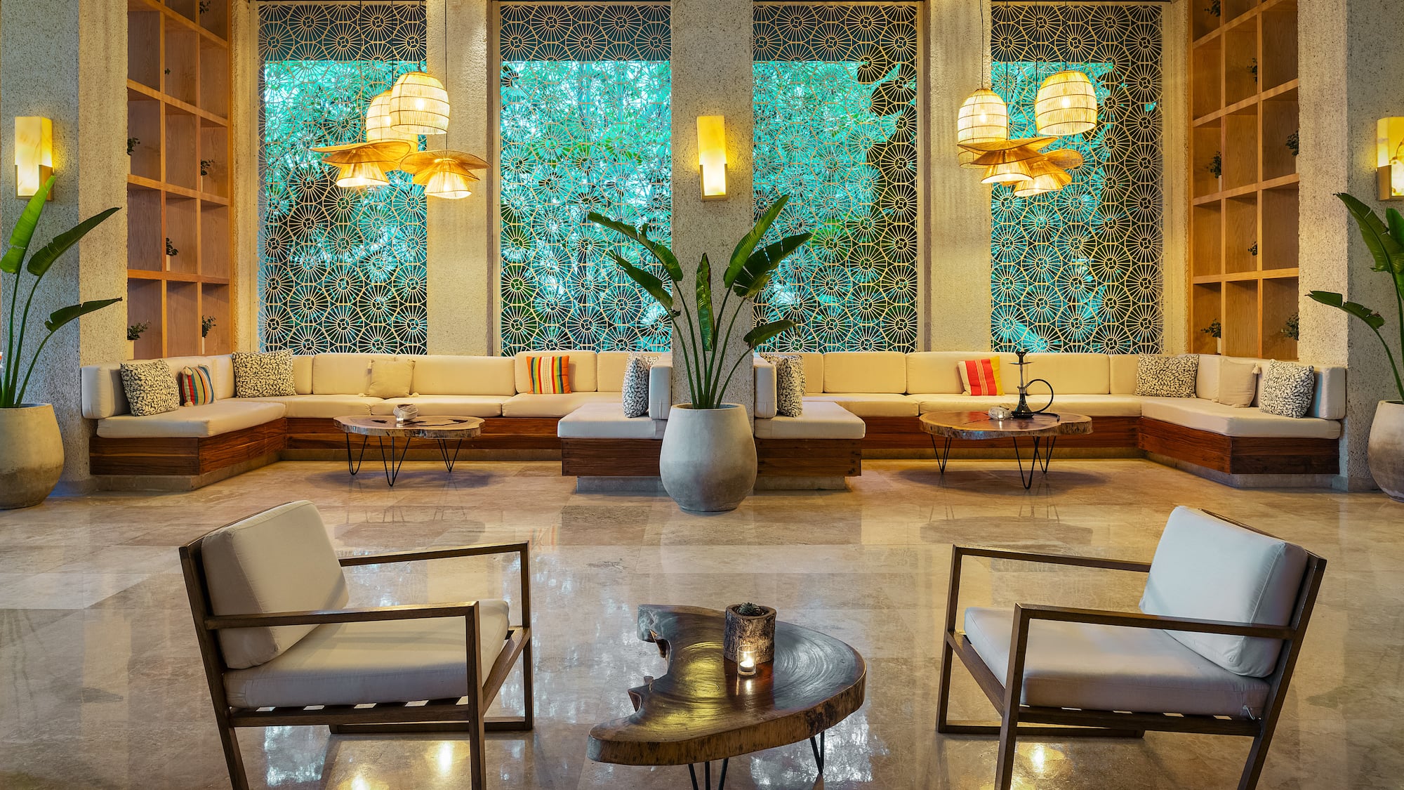 a room with a large window and chairs