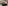 Meliá Kuala Lumpur conference room with projector screen, podium, and seating.