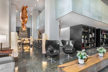 a room with chairs and a table
