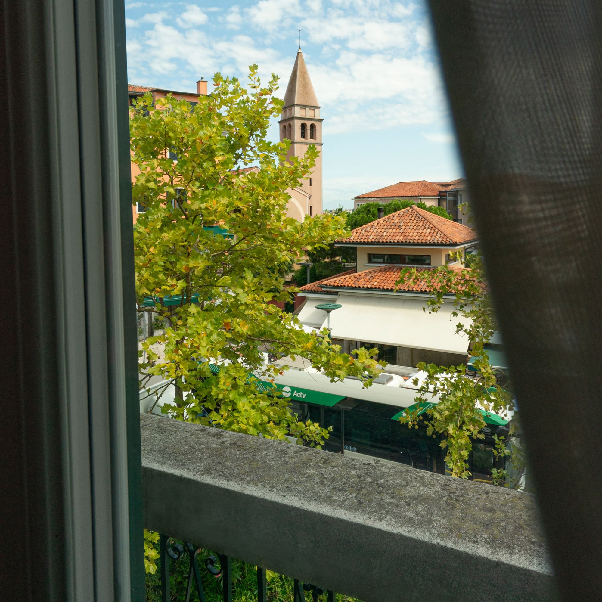 a view of a building from a balcony