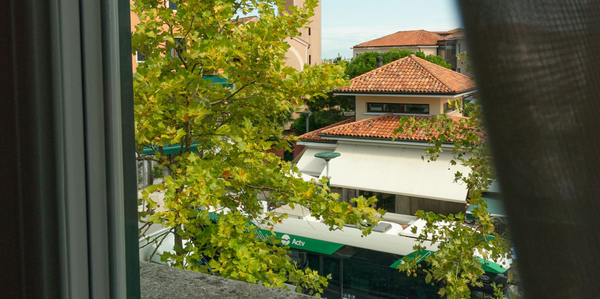 a view of a building from a balcony